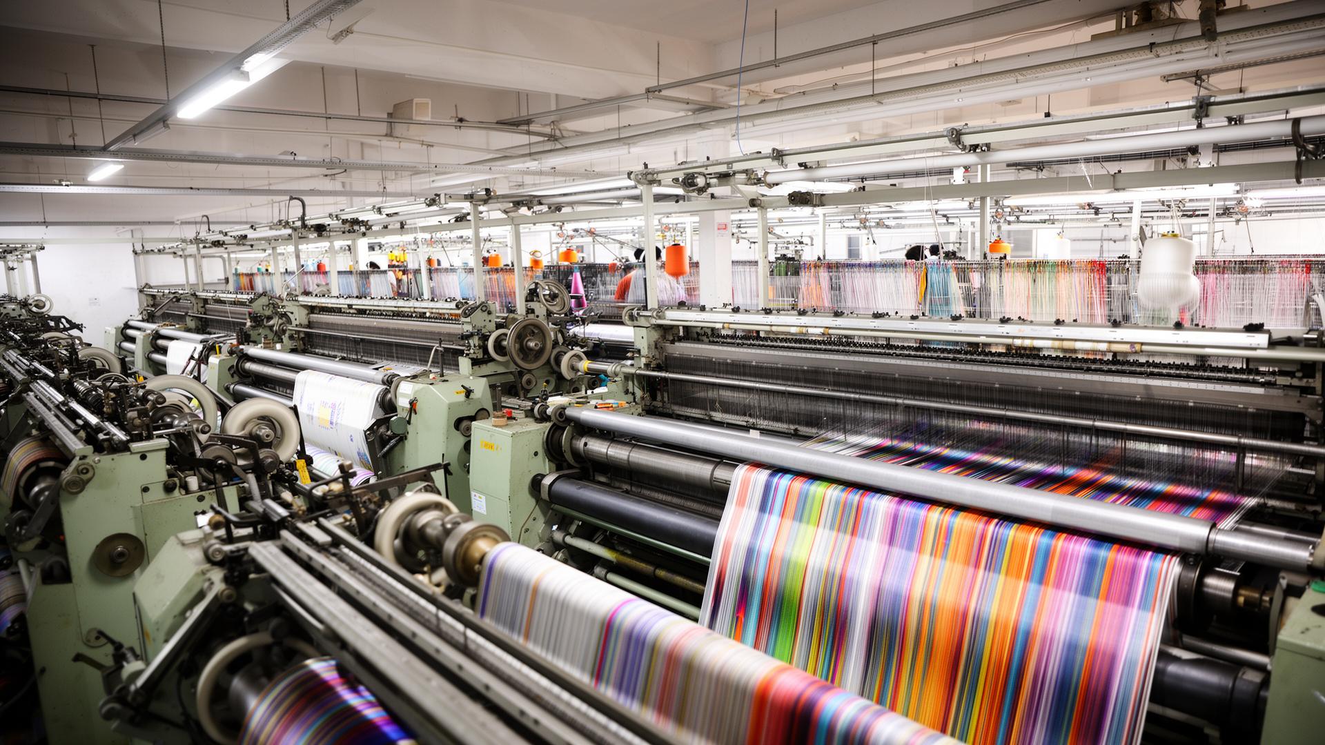 Inside Hanuman Fabrics factory in Surat with high-speed rapier Jacquard looms